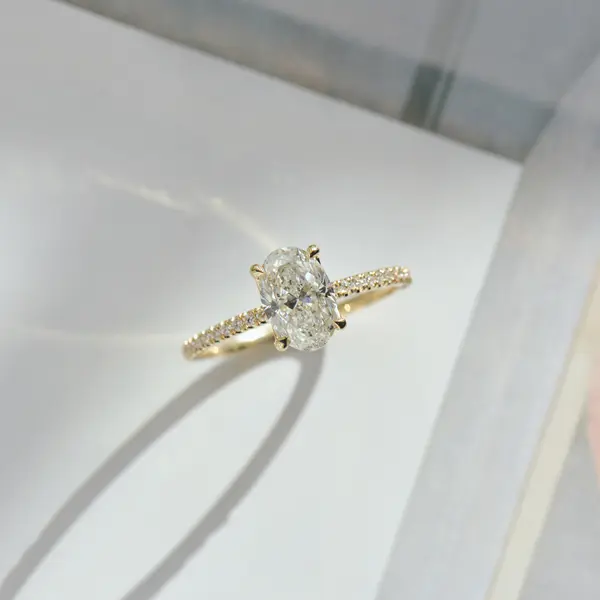 Oval Solitaire Engagement Ring With Pavé