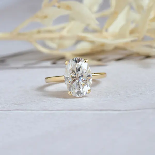 Oval Moissanite Solitaire Engagement Ring With Pavé Bridge