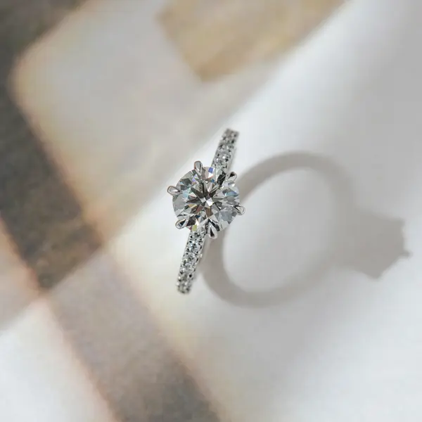 Classic Round Hidden Halo Engagement Ring With Pavé