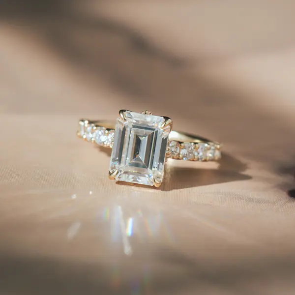 Emerald Moissanite Engagement Ring With Petal Prongs And Pavé