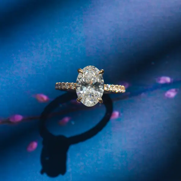 Oval Engagement Ring With Pavé And Hidden Halo
