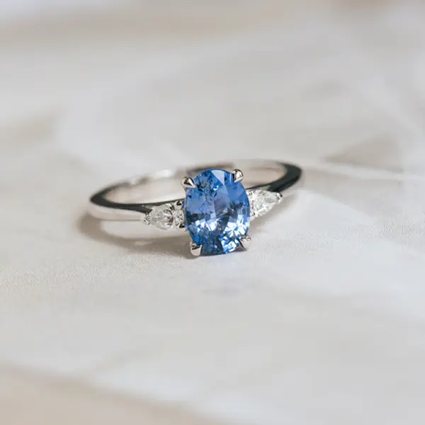 Oval Sapphire And Pear 3-Stone Engagement Ring