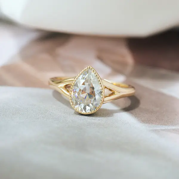 Bezel Set Pear Engagement Ring With Split-Shank