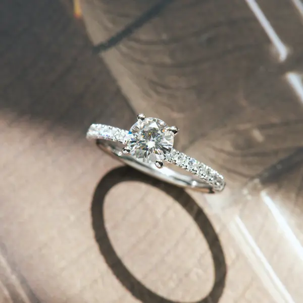 Round 4-Prong Engagement Ring With Pavé Band