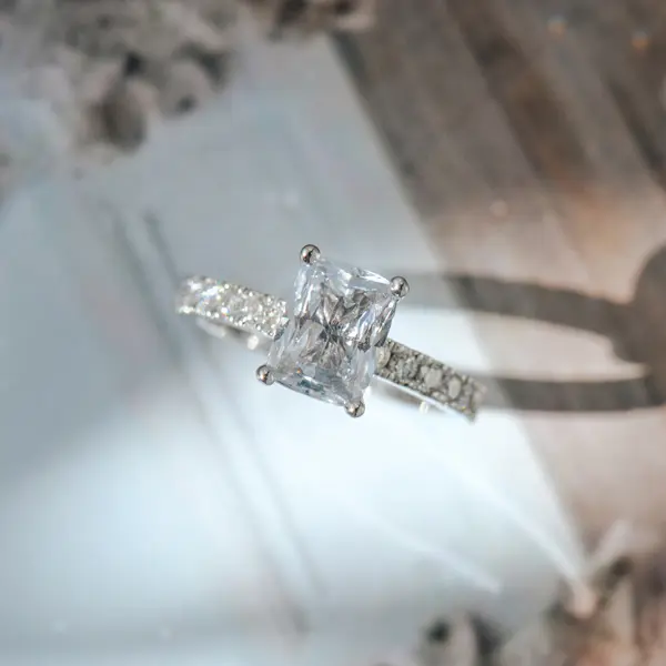 Radiant Engagement Ring With Pavé Band And Hidden Halo