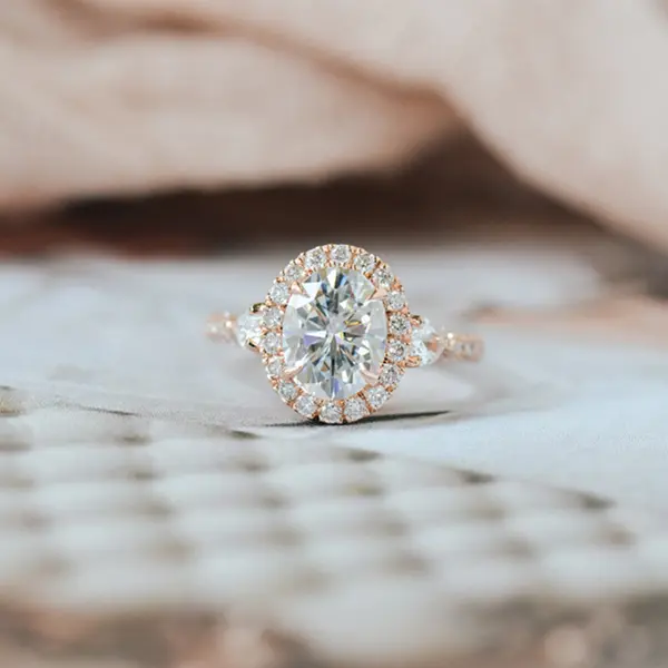 Halo Oval And Pear 3-Stone Engagement RIng