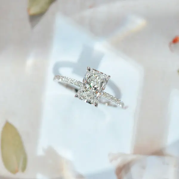 Radiant Cut Solitaire Engagement Ring With Pavé Band