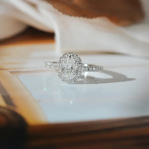 Oval Halo Engagement Ring With Fine Tip Prongs