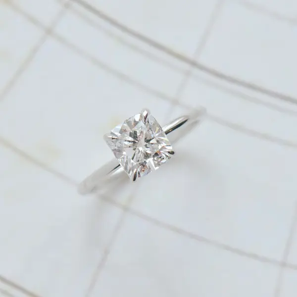 Square Cushion Engagement Ring With Petal Prongs