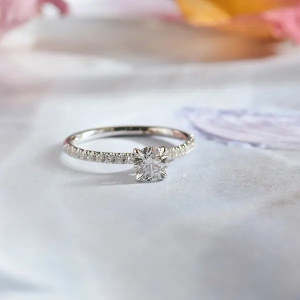Classic 4-Prong Round Engagement Ring With Pavé