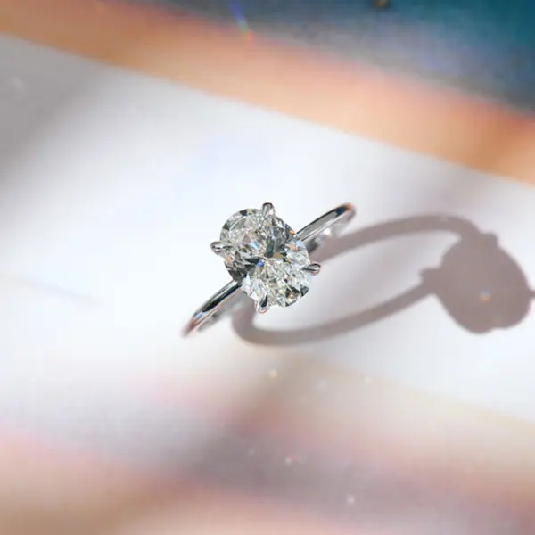 Classic Solitaire Oval Engagement Ring With Fine Short Tip Prongs