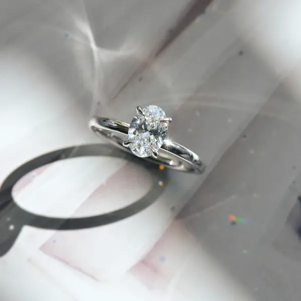 Classic Oval Solitaire Engagement Ring With Fine Tip Prongs