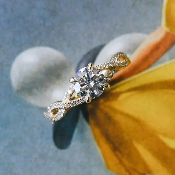 Round 4-Prong Engagement Ring With Pavé Twist Band