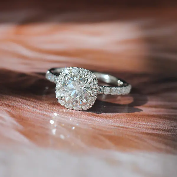 Round-Cut Engagement Ring With Cushion Halo