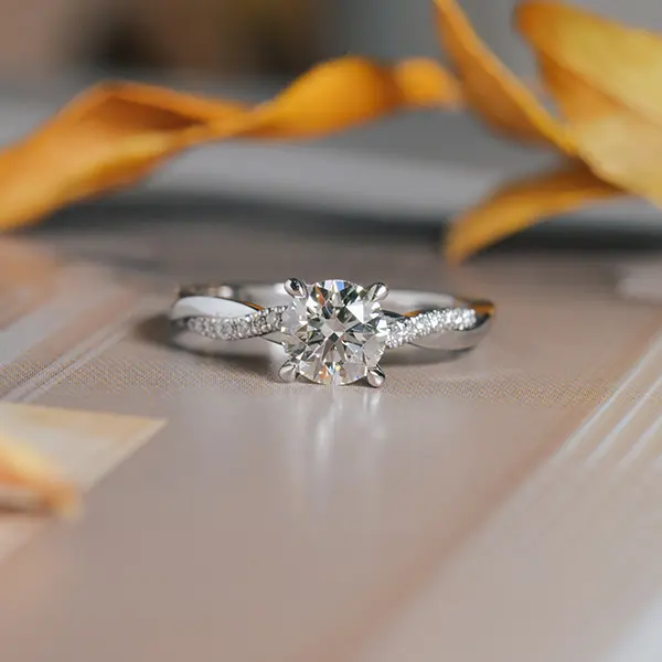 Round Engagement Ring With Pavé Twist Band