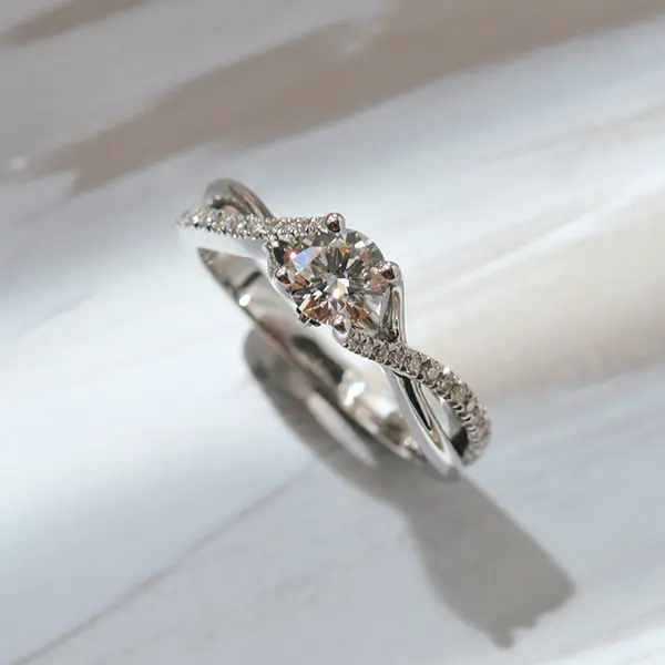 Round Engagement Ring With Twist Band And Round Prongs