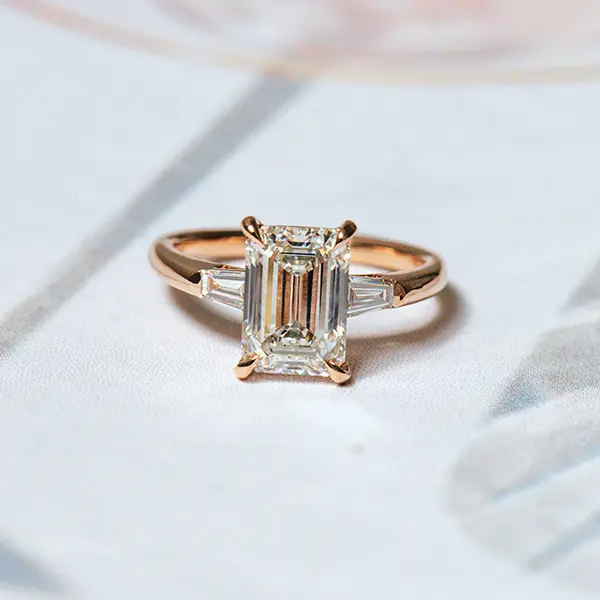 Emerald and Tapered Baguettes 3-Stone Engagement Ring