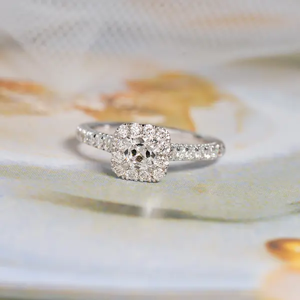 Cushion Halo Engagement Ring With Peekaboo Gemstones