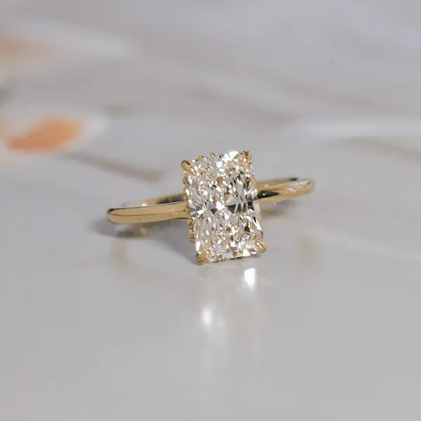 Radiant Engagement Ring With Different Size Stones Hidden Halo