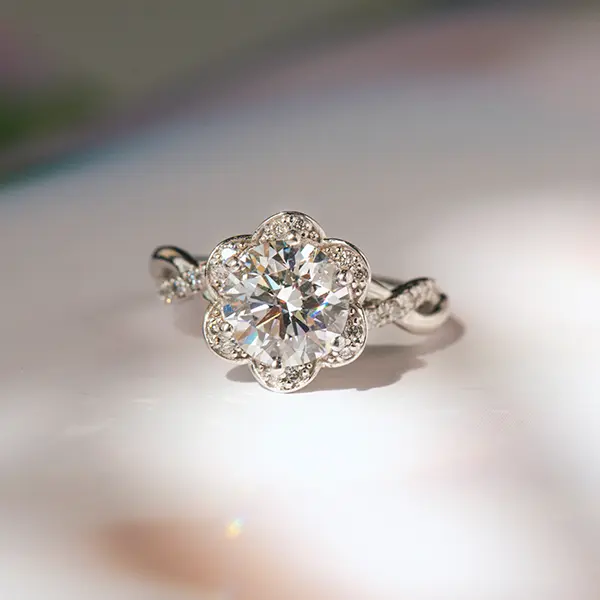 Round Petal Halo Engagement Ring With Twist Band