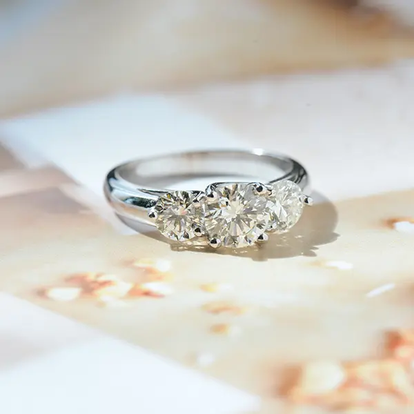 Round 3-Stone Engagement Ring With Trellis Setting