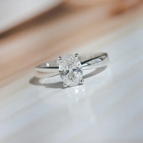 Oval Solitaire Engagement Ring With Tapered Band
