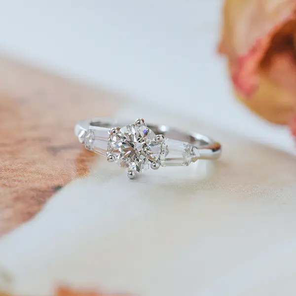 Round 3-Stone Engagement Ring With Tapered Step-Cut Bullet Side Stones