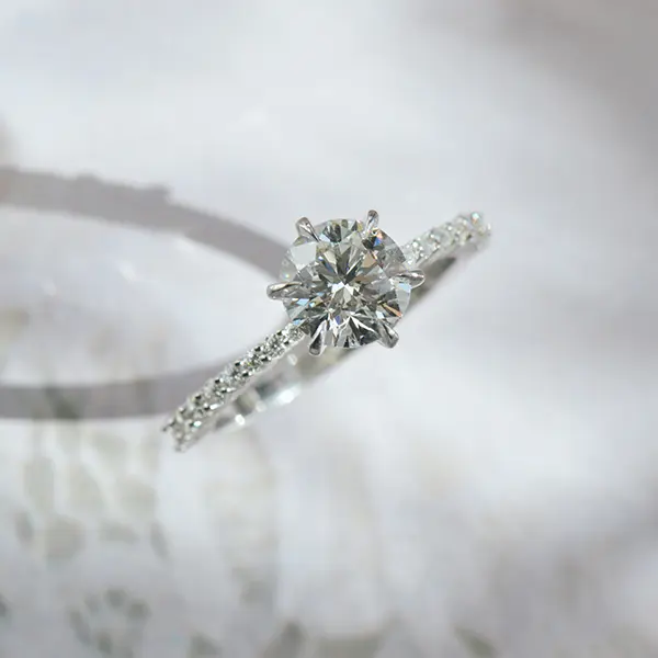 Round 6-Prong Engagement Ring With Tapered Pavé Band