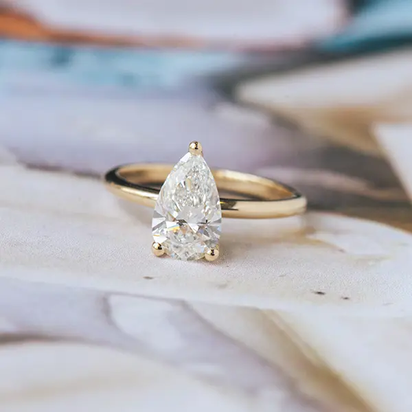 Pear Solitaire Engagement Ring With Hidden Halo