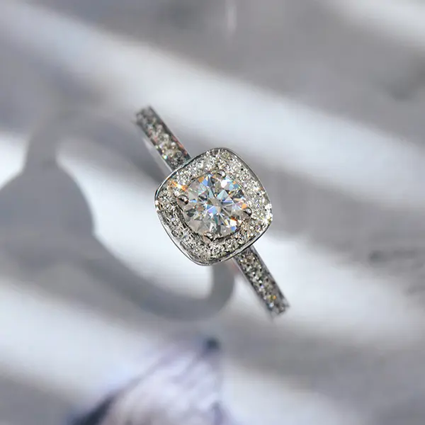 Round Engagement Ring With Cushion Halo Channel Set