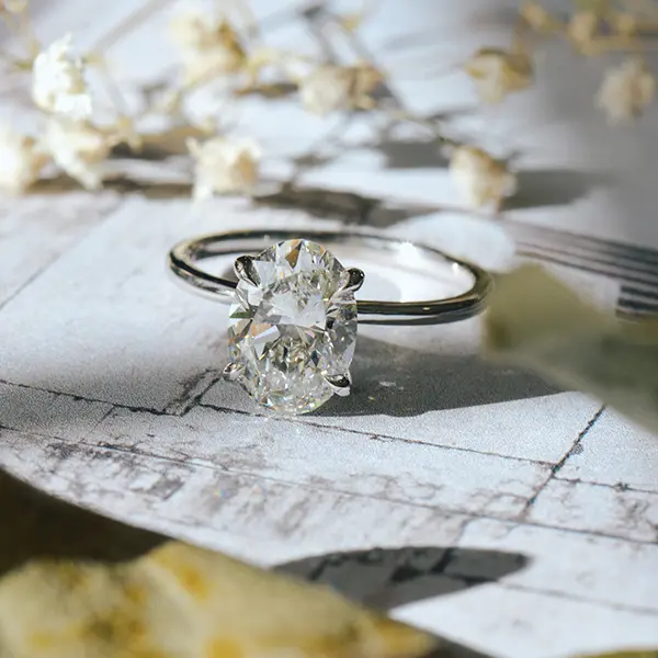 Oval Solitaire Engagement Ring With Hidden Halo-top