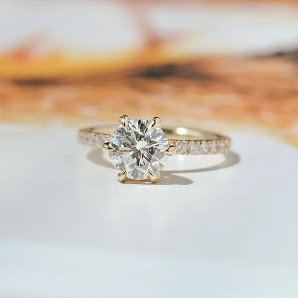 Round 6-Prong Engagement Ring With Diamonds on the Prongs