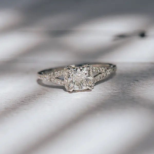 Cushion Engagement Ring With Collared Halo and Split Shank