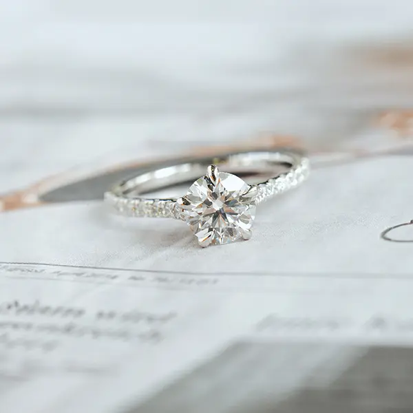 Round 5-Prong Engagement Ring With Pavé Band