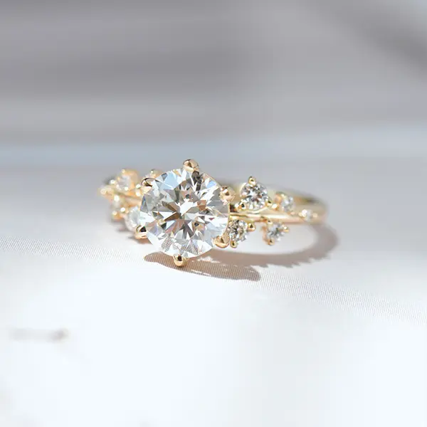 Round Engagement Ring With Clustered Stones -top