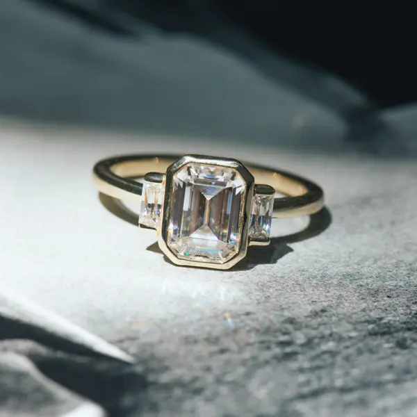 Bezel Set 3-Stone Emerald-Cut Engagement Ring