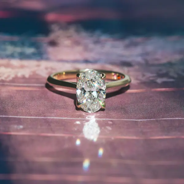 4-Prong Oval Engagement Ring With Petal Prong