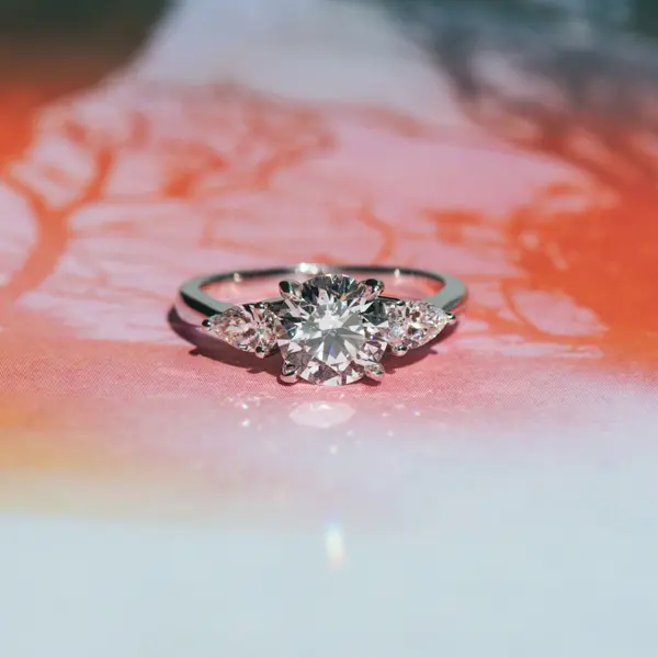 Round and Pear 3-Stone Engagement Ring