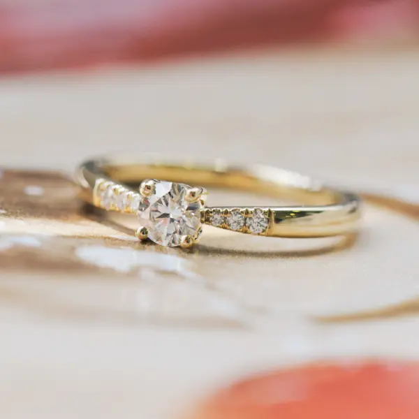Solitaire Round Engagement Ring With Tapered Band