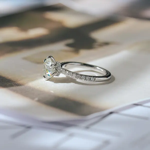 Classic Round Hidden Halo Engagement Ring With Pavé-side
