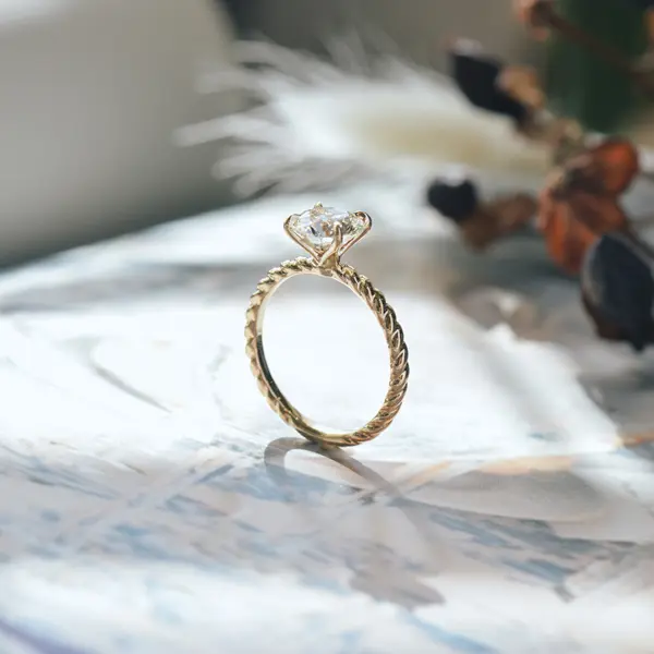 Round Petal Prong Engagement Ring With Braided Band-side
