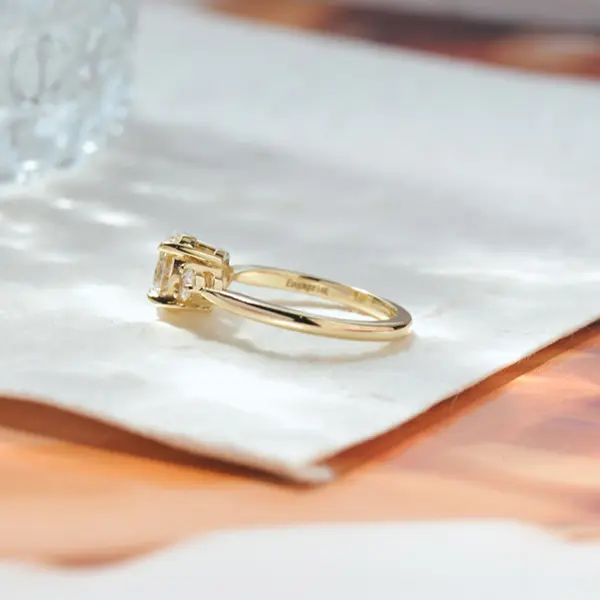 3 Stone Oval And Round Engagement Ring With Tapered Band-side