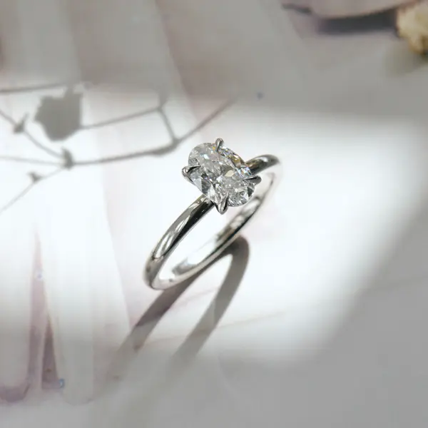 Classic Oval Solitaire Engagement Ring With Fine Tip Prongs-side