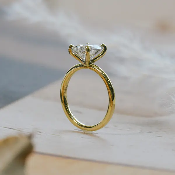 Oval Solitaire Engagement Ring With Round Prongs-side