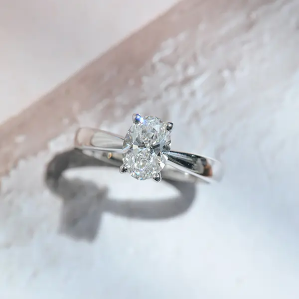 Oval Solitaire Engagement Ring With Tapered Band-side