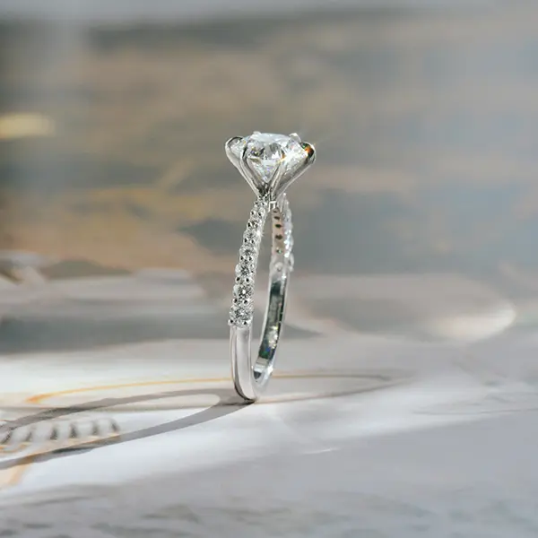 Round 6-Prong Engagement Ring With Tapered Pavé Band-side