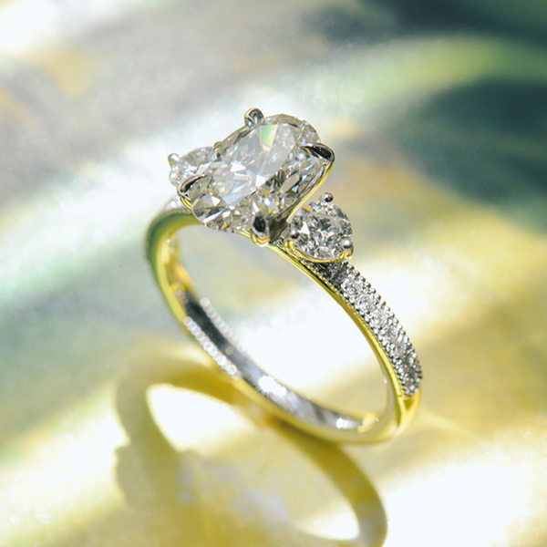 Oval And Round Three Stone Engagement Ring With Pavé-side