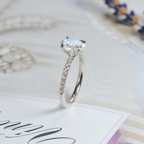 Oval Engagement Ring With 1.5mm Pavé Band-side