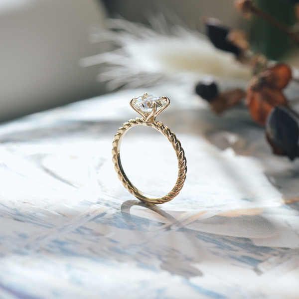 Round Petal Prong Engagement Ring With Braided Band-side