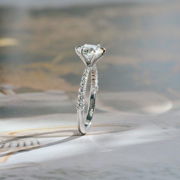 Round 6-Prong Engagement Ring With Tapered Pavé Band-side